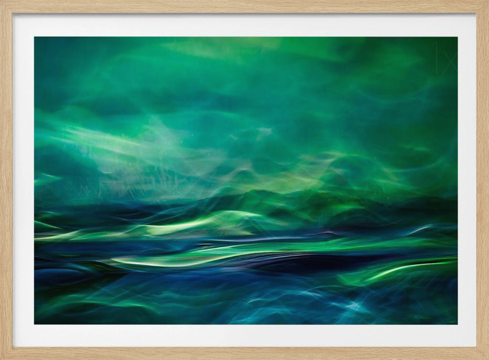 A framed abstract artwork featuring a luminous, dreamlike landscape of swirling green and blue light. The top half glows with a vibrant green haze like the northern lights, while the bottom half depicts dark blue and green waves with bright, energetic highlights, creating a sense of mystical water and sky. Wall Art