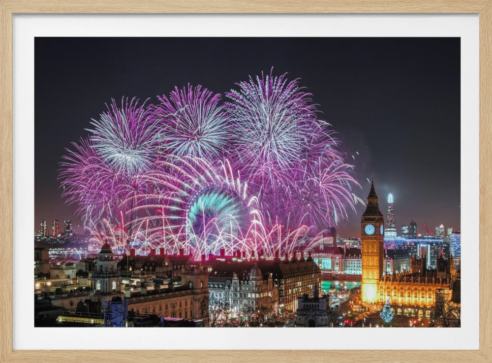 A vibrant night-time cityscape of London featuring a massive fireworks display in purple, pink, and white exploding over landmarks like the London Eye and the illuminated Big Ben clock tower, all within a silver frame. Decor