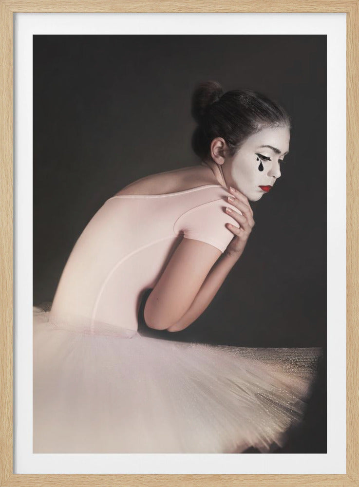 A portrait of a sad ballerina with white mime makeup and a black teardrop painted on her cheek, wearing a pink leotard and white tutu against a dark gray background. Artwork