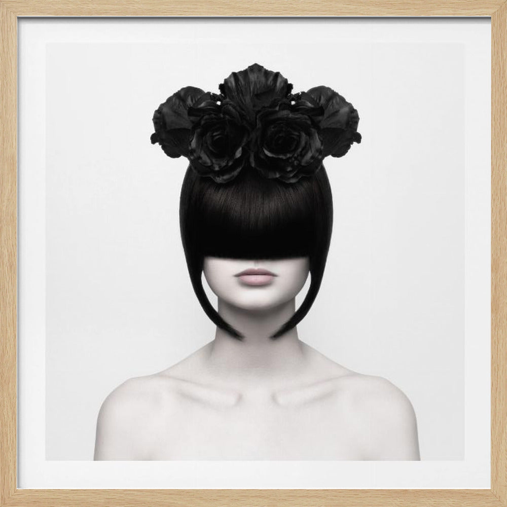 A stylized black and white portrait of a woman with a sleek black bob hairstyle where the bangs completely cover her eyes. She wears a large, elaborate headpiece made of black roses. Her expression is neutral, showing only her mouth and chin. The image is set against a plain white background and enclosed in a light wood frame. Print