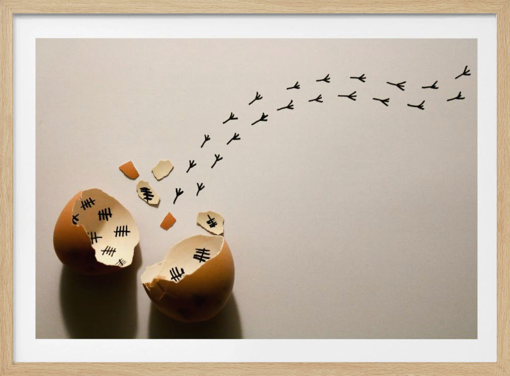 A conceptual art piece showing a broken brown eggshell against a beige background. Inside the shell are black tally marks, as if counting days. A trail of tiny black chicken footprints leads away from the egg, suggesting a chick has finally hatched and escaped after a long wait. Artwork