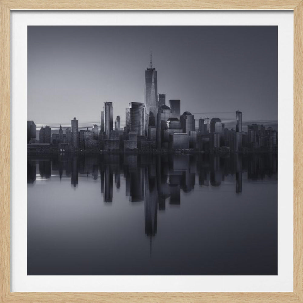 A framed, moody black and white photograph of the Lower Manhattan skyline, featuring the One World Trade Center, with a perfect, still reflection of the skyscrapers in the water below. Decor