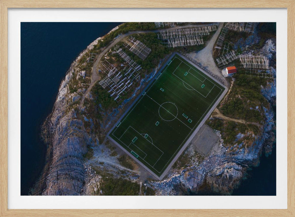 An art print featuring a distant view of a football field under a wide sky, evoking a sense of space and tranquility. Wall Art