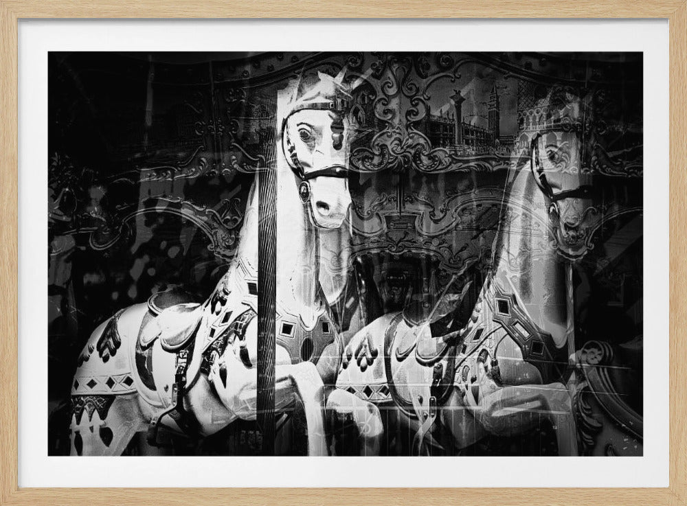 A framed, black and white artistic photograph featuring a double exposure of two ornate carousel horses. A detailed, white horse in the foreground stares forward, while another is positioned behind it. The background is a layered composition of baroque patterns and a faint depiction of a European cityscape, creating a dreamlike and nostalgic atmosphere. Wall Art