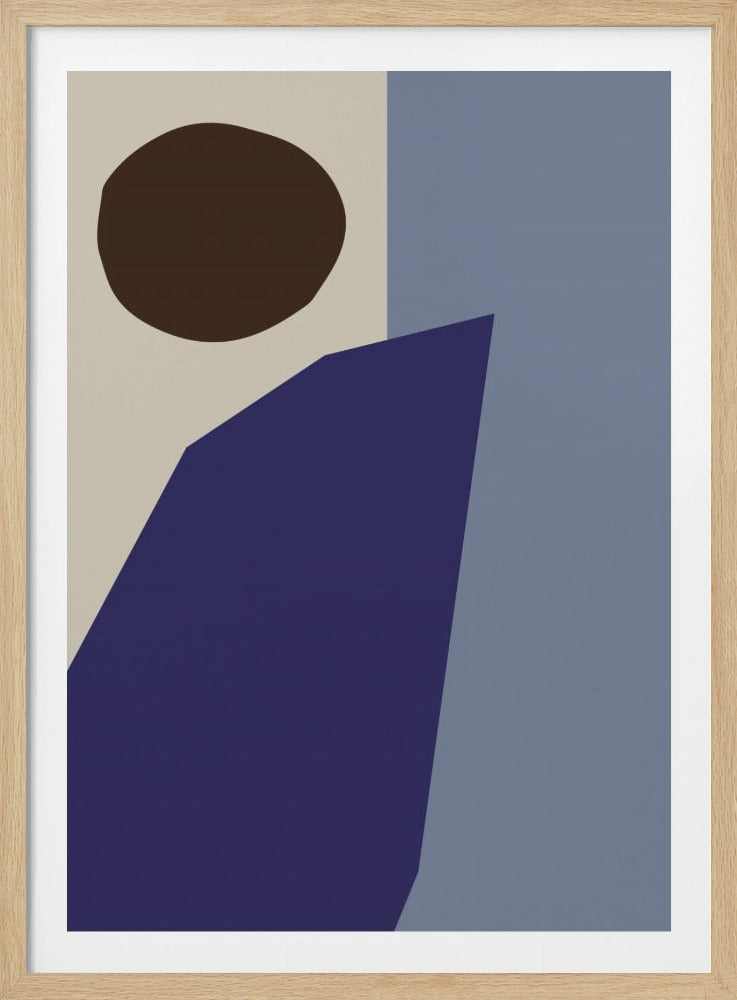 A minimalist abstract artwork in a black frame, featuring color-blocked sections of beige and slate blue. A dark brown circle is in the upper left, and a large, angular deep indigo shape dominates the lower portion of the piece. Wall Art