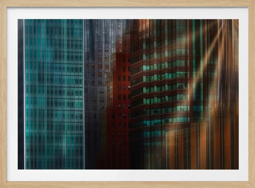An abstract cityscape artwork in a silver frame, featuring a teal glass skyscraper on the left transitioning to red and brown buildings on the right with a strong vertical motion blur effect, creating a dynamic sense of movement. Decor