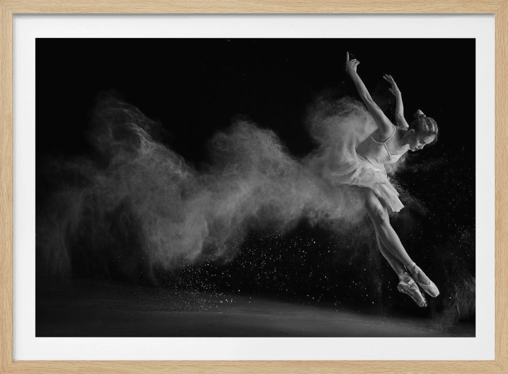 A dynamic black and white photograph of a ballerina leaping through the air, her movement creating a dramatic cloud of white powder against a solid black background. Artwork
