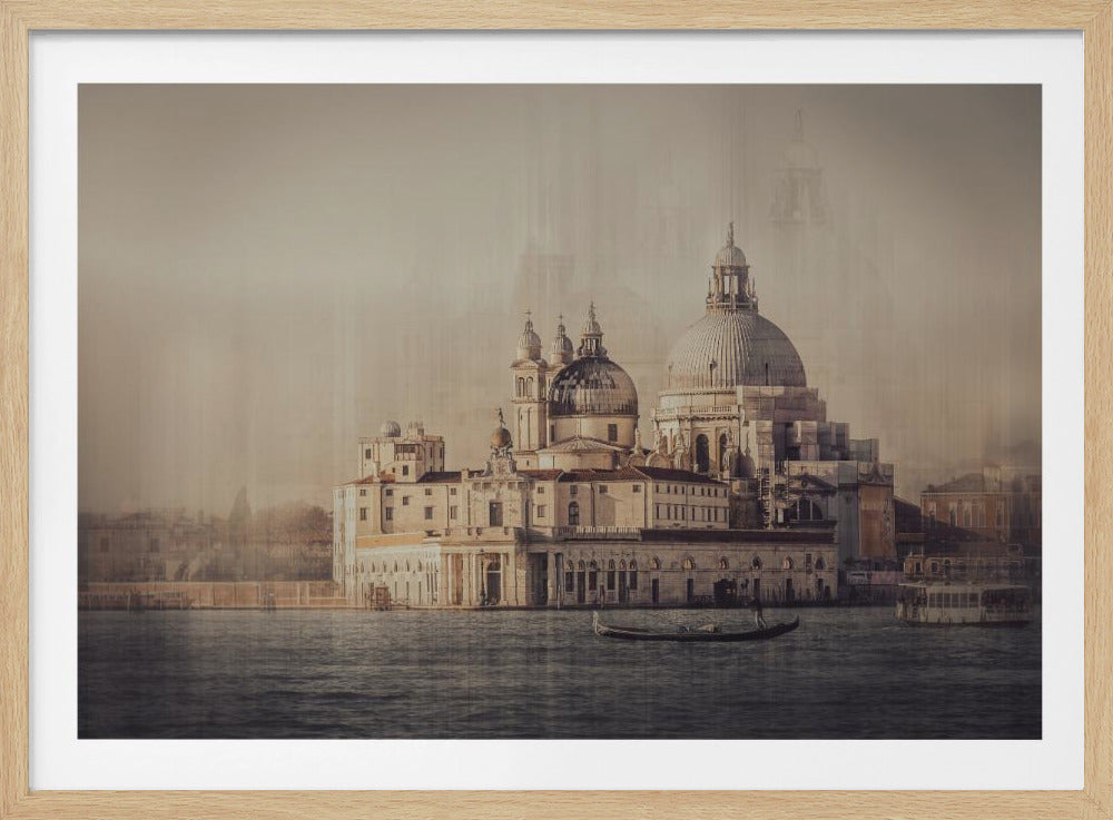 A vintage-style framed photograph of the Basilica di Santa Maria della Salute in Venice, Italy. The grand domed church is seen from across the water, with a gondola floating in the foreground. The image has a hazy, sepia-toned filter, creating a nostalgic and dreamlike atmosphere, all encased in a silver frame. Poster