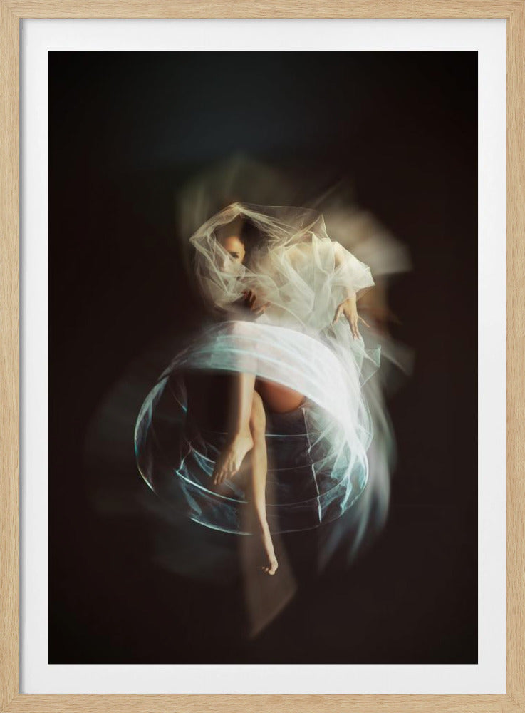 An ethereal, artistic portrait of a woman against a dark background. She is wrapped in flowing, translucent white fabric that blurs with motion, creating a ghostly effect. Her face is partially obscured by a sheer veil, and she appears to be gracefully suspended within a glowing, circular structure. Poster