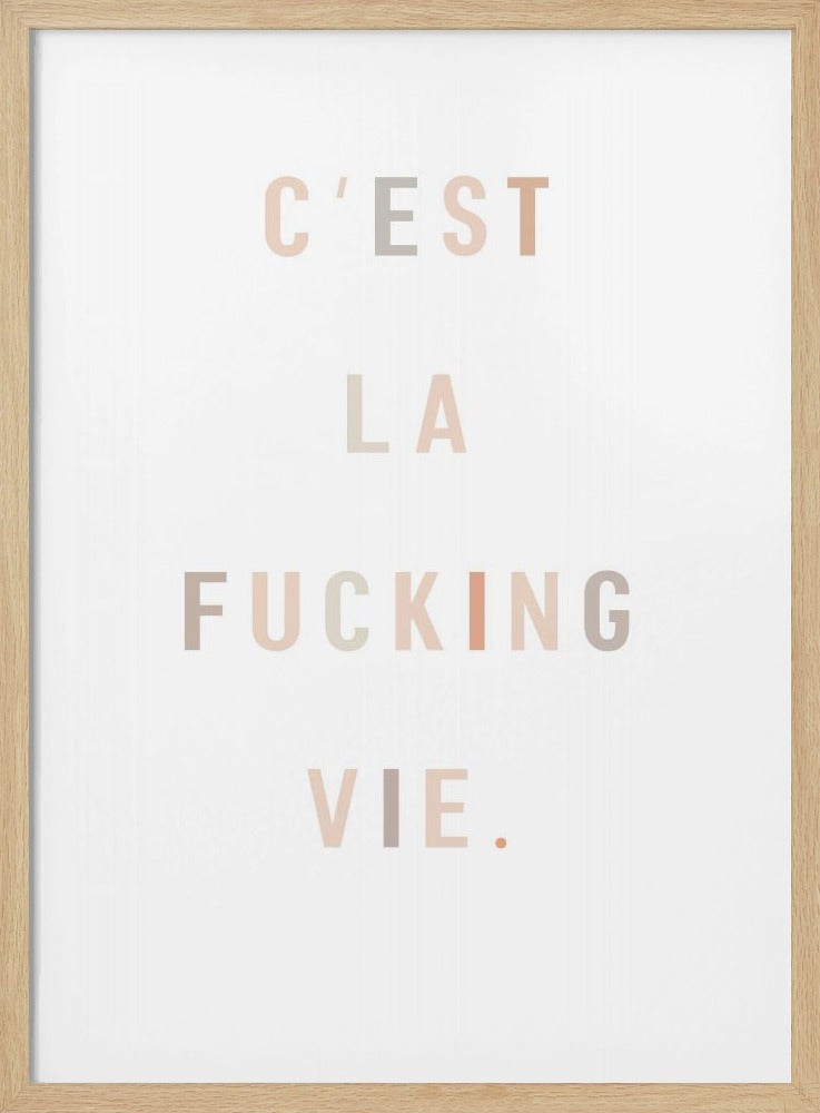 A minimalist typography poster in a thin black frame. Against a white background, the French phrase 'C'EST LA FUCKING VIE.' is written in a bold, sans-serif font. The words are stacked vertically, and the letters are colored in various muted shades of beige, pink, and grey. Print