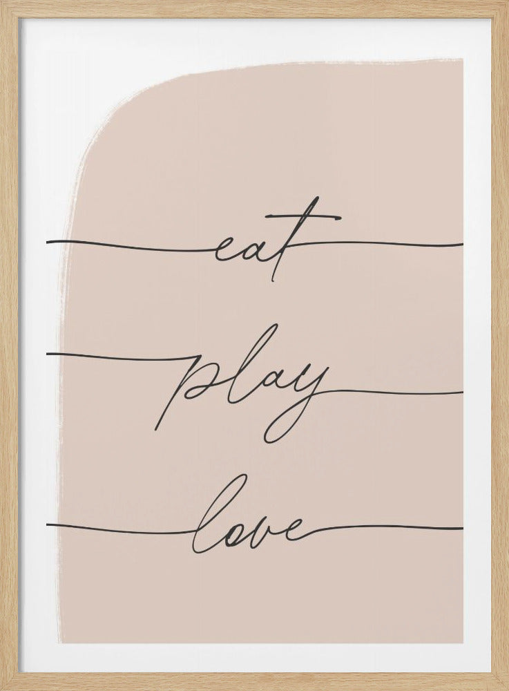 A modern typographic art print in a black frame. The words 'eat', 'play', and 'love' are written in a black cursive script, each on a separate line against a pale pink painted background. Print