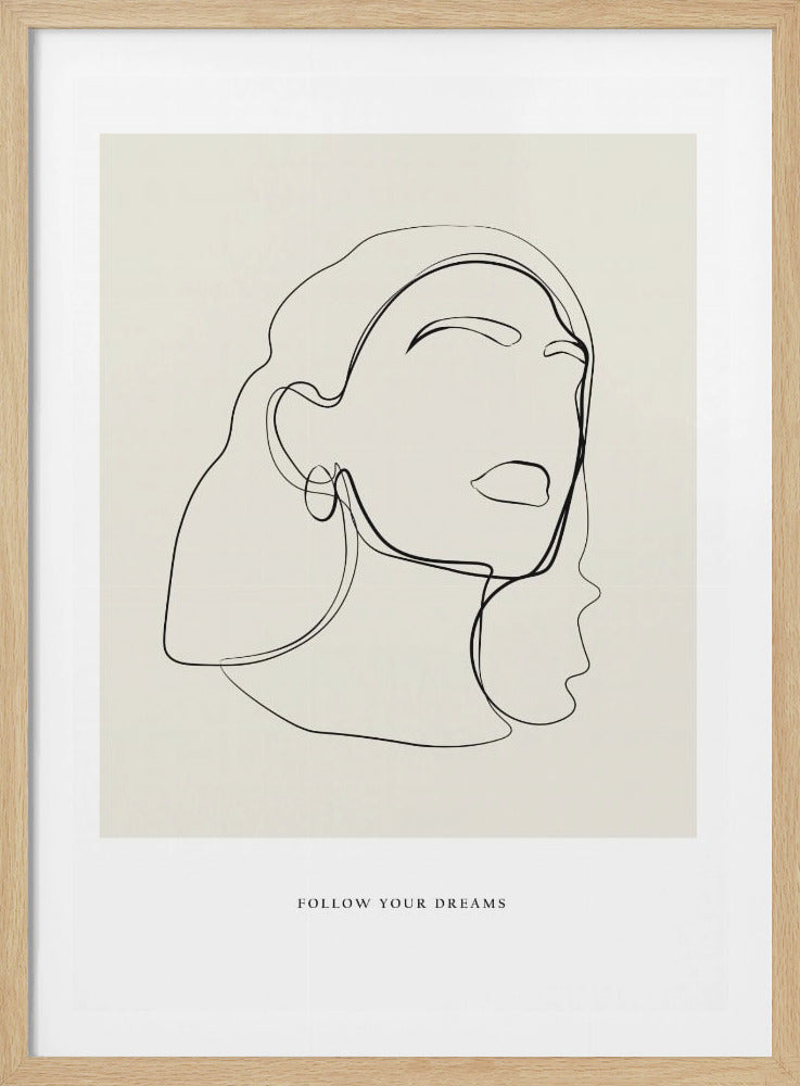 A minimalist line art poster in a black frame, featuring a single continuous black line that forms the abstract profile of a woman with closed eyes on a beige background. Below the artwork, the text 'FOLLOW YOUR DREAMS' is printed in a small, capitalized font. Print