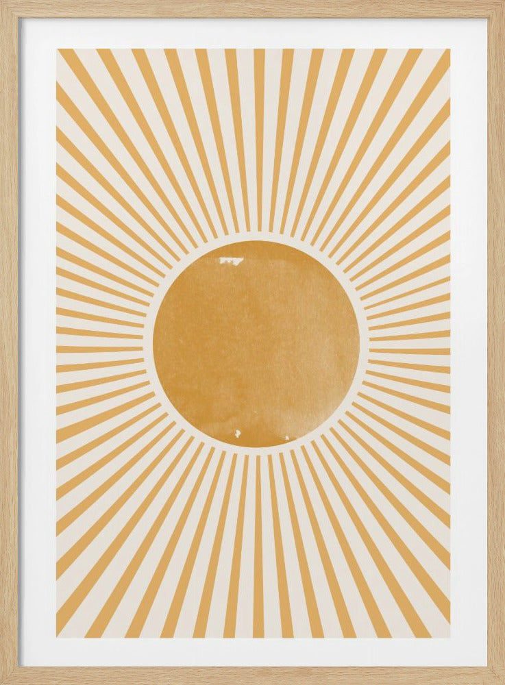 A minimalist art print in a black frame featuring a stylized sun. A central, textured golden-yellow circle has numerous straight, sharp rays of the same color radiating outwards to the edges against a light cream background. Wall Art