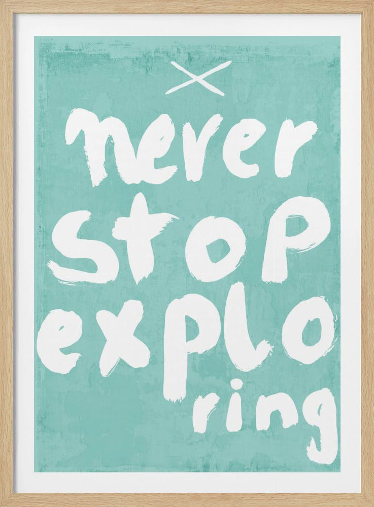 An inspirational framed poster with a textured teal background featuring the phrase 'never stop exploring' written in a bold, white, handwritten brush script. A small white 'X' is painted above the text. Decor