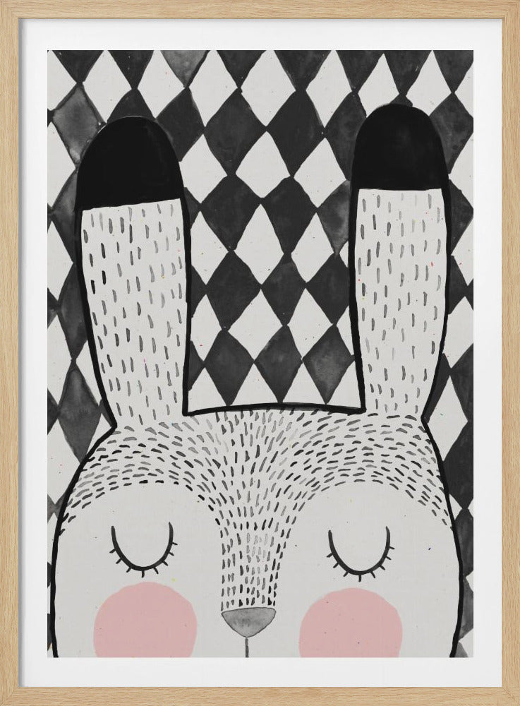 A whimsical illustration of a sleeping bunny's face against a black and white harlequin background. The bunny has long ears with black tips, closed eyes, and round pink cheeks, rendered in a charming, hand-drawn style. Artwork
