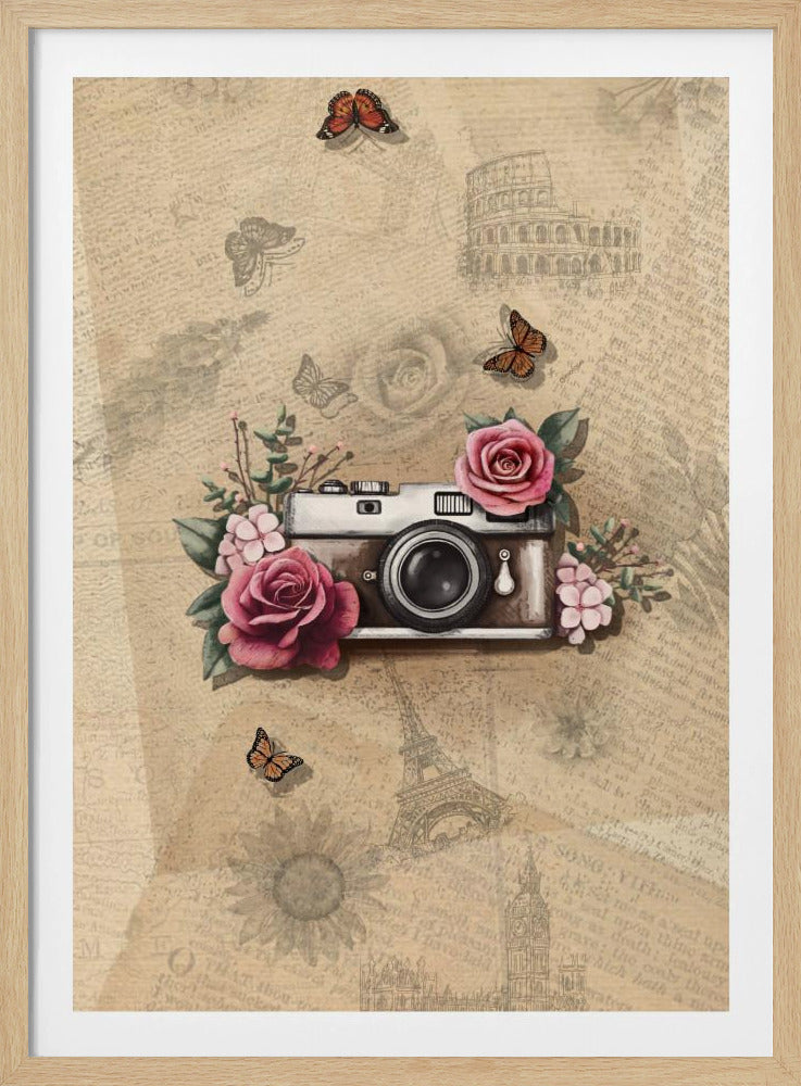 A vintage-style collage art piece in a black frame. The central focus is a retro camera adorned with pink and magenta roses and green leaves. The background is a sepia-toned collage of old newspaper or book pages, with faint illustrations of European landmarks like the Colosseum and the Eiffel Tower, along with butterflies and flowers. Poster