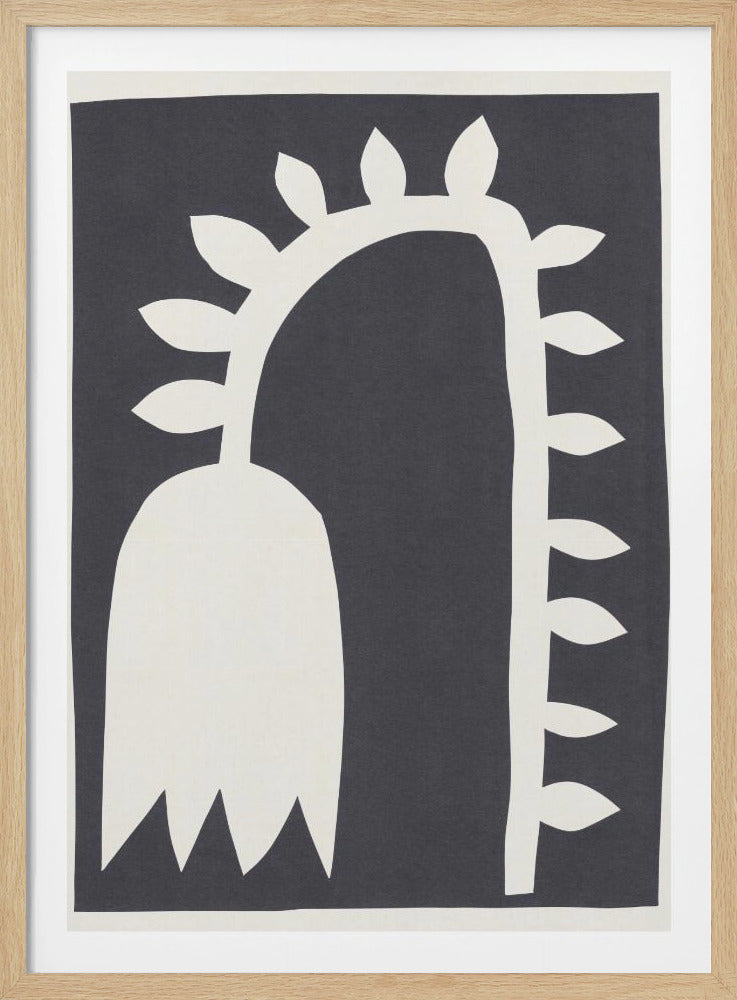 A minimalist abstract artwork in a black frame, featuring an off-white paper-cutout style shape of a drooping flower with a thick, arching stem against a dark charcoal grey background. Small, pointed leaves sprout from the stem, and the bell-shaped flower head has a jagged bottom edge. Decor
