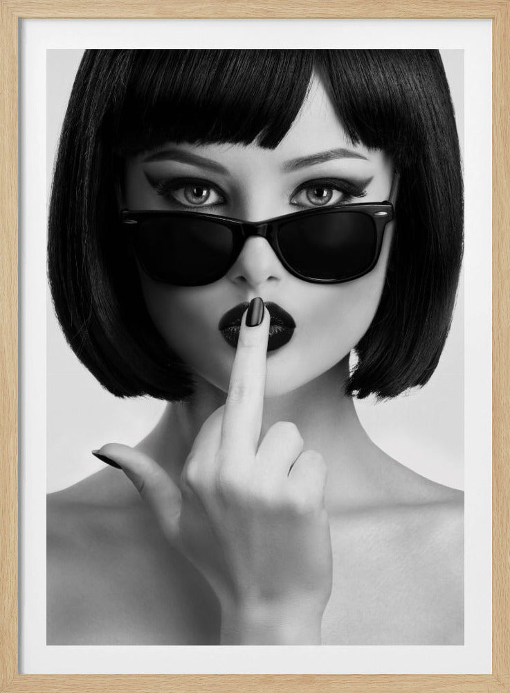 A striking black and white portrait of a woman with a sharp bob haircut, sunglasses, and bold makeup. She holds one finger with a black-painted nail up to her dark lips, making a 'shushing' gesture. Poster