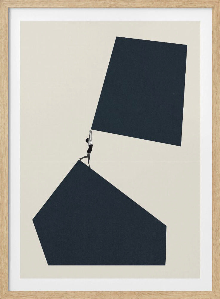 A minimalist abstract collage featuring a small black-and-white figure of a woman standing on the precipice of a large, dark blue geometric shape. She reaches up to hold the corner of another dark blue shape above her, creating a surreal and balanced composition against an off-white background, all within a black frame. Decor