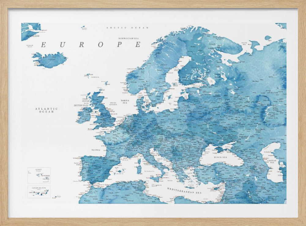 A framed map of Europe with a blue watercolor texture. The land is depicted in various shades of blue, while the oceans are white. Countries, cities, and bodies of water are labeled in black text. The map is housed in a simple, light gray frame. Poster