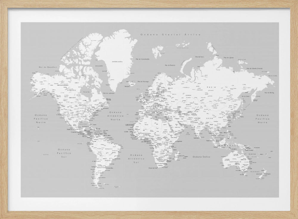 A detailed world map in Spanish with a monochromatic color scheme, framed in a light gray wooden frame. The continents are shown in white on a light gray ocean background, with countries and numerous cities labeled in black text. Artwork