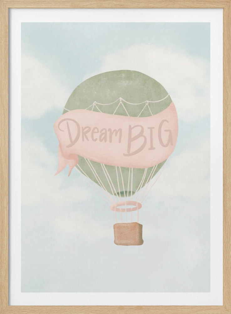 A framed piece of nursery art featuring a watercolor illustration of a green hot air balloon against a pale blue sky with white clouds. A pink banner draped across the balloon has the words 'Dream BIG' written in cursive. Print