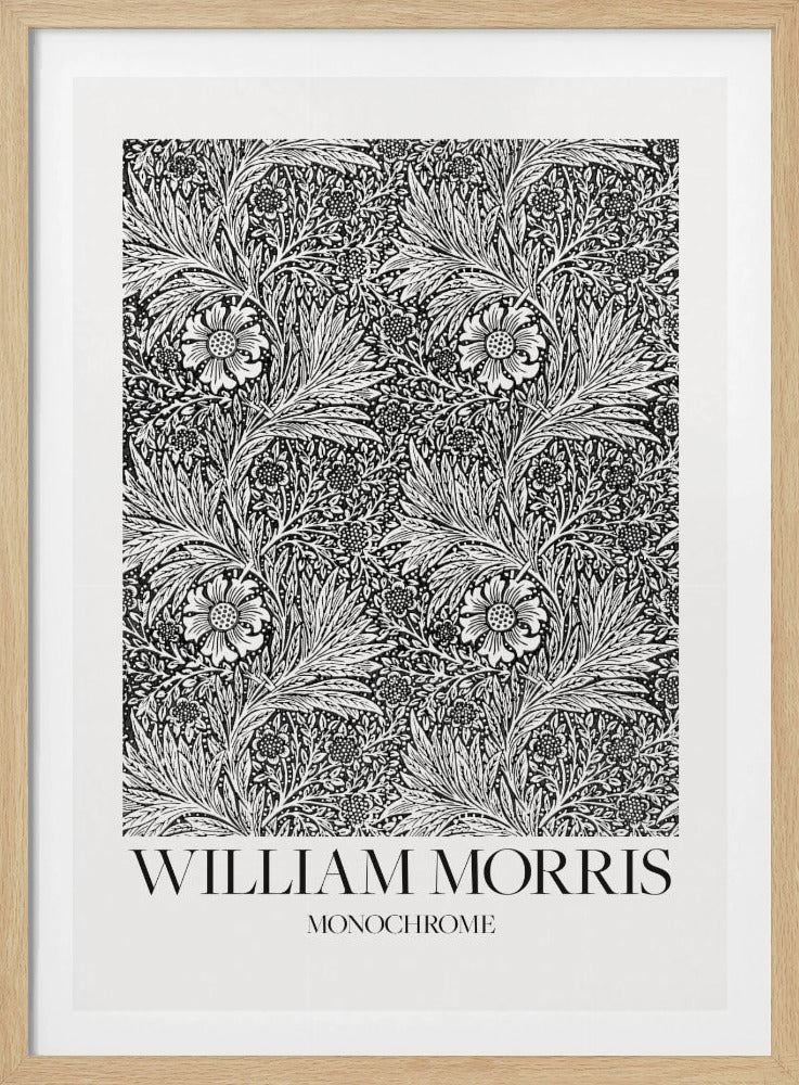 A framed art print featuring a classic William Morris pattern in monochrome. The intricate black and white design is filled with dense, swirling foliage and stylized flowers. The artwork has a white border, and at the bottom, the text 'WILLIAM MORRIS' is displayed prominently, with 'MONOCHROME' written underneath in a smaller font. Artwork