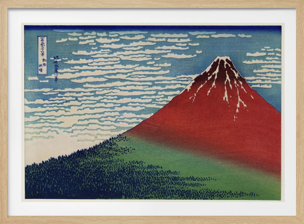 A Japanese woodblock print, Hokusai's 'Fine Wind, Clear Morning', showing a large, reddish-brown Mount Fuji with snow at its peak. Below the mountain is a dense green forest, and above is a blue sky with rows of white, stylized clouds. Print