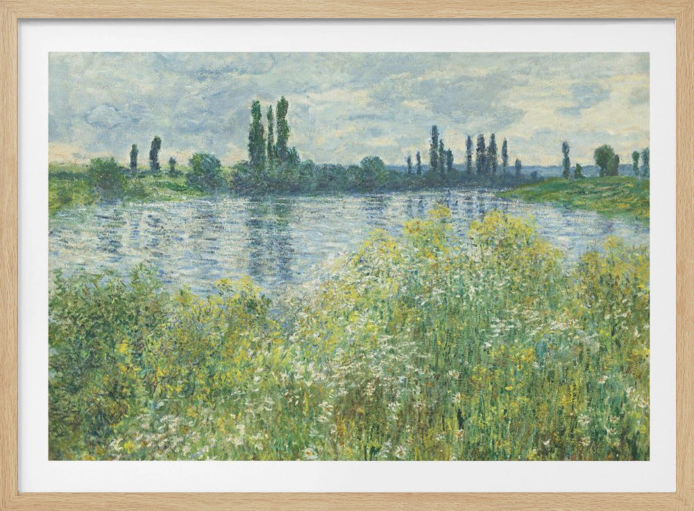 An impressionist painting of a tranquil river scene, with a field of yellow and white wildflowers in the foreground. Tall poplar trees line the distant riverbank under a cloudy sky, all enclosed in a silver frame. Decor