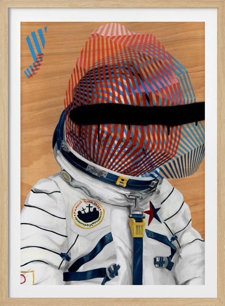 A modern pop art illustration of an astronaut's bust against a wood grain background. The astronaut's helmet is covered in a geometric pattern of red and blue stripes, and the visor is obscured by a black spray-painted line with drips. A patch on the white spacesuit reads 'Famous When Dead'. Poster
