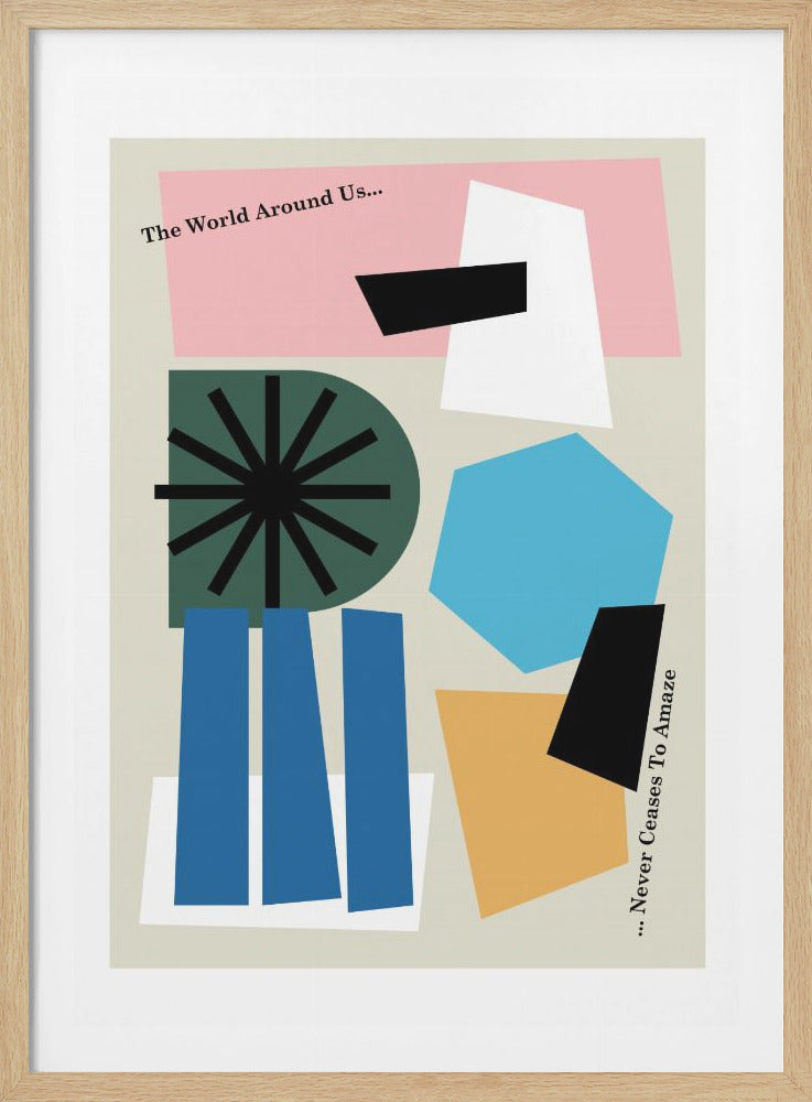 An abstract art print with a collage of colorful geometric shapes on a light beige background. The shapes include a pink rectangle, a green semi-circle with a black asterisk pattern, blue vertical bars, a light blue hexagon, and other black, white, and orange forms. The piece is framed in black and includes the text 'The World Around Us... Never Ceases To Amaze.' Poster