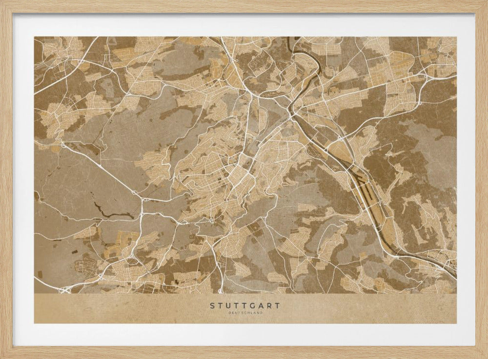 A framed, stylized map of Stuttgart, Germany, in shades of brown and beige. Major roads and waterways are highlighted in a contrasting cream color, creating a detailed and modern look. The city name 'STUTTGART' is written at the bottom. The entire map is enclosed in a simple silver-colored frame. Poster
