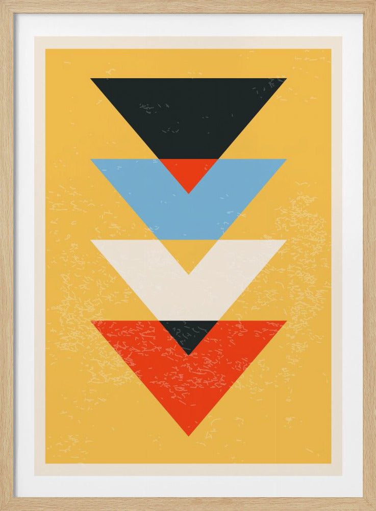 A framed abstract art print featuring a vertical row of four overlapping, downward-pointing triangles in black, blue, white, and red on a textured mustard yellow background. Artwork