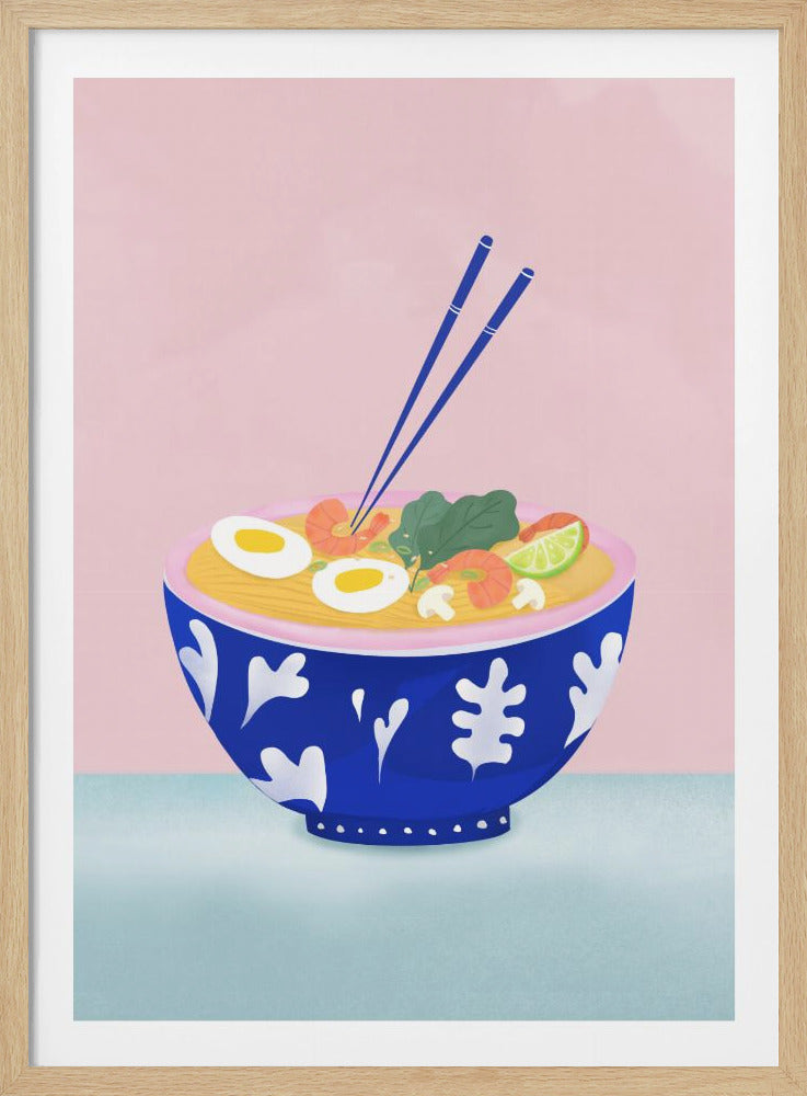 A colorful illustration of a bowl of ramen against a pink background. The ornate blue bowl with a white pattern is filled with noodles, broth, shrimp, sliced eggs, mushrooms, and a lime wedge. A pair of blue chopsticks is sticking out of the bowl. Wall Art