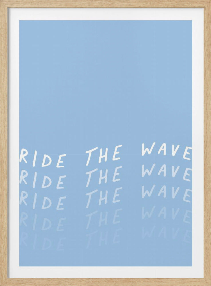 A framed art piece with a light blue background. The phrase 'RIDE THE WAVE' is written in a white, handwritten font and repeated multiple times, fading with each line down the poster. Wall Art