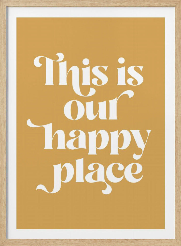 A framed art print with a mustard yellow background and the words 'This is our happy place' in a stylized white serif font. The text is centered and arranged in four lines. The print is housed in a simple black frame. Poster