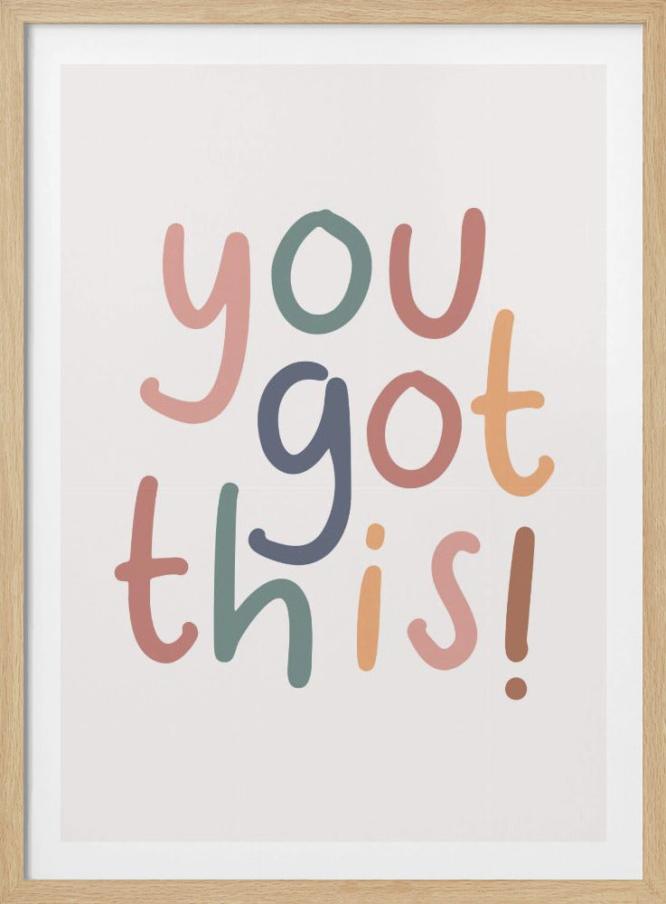 A framed poster with the motivational phrase 'you got this!' written in a colorful, handwritten style. The words use a muted palette of pink, blue, green, and orange on a simple white background. Decor