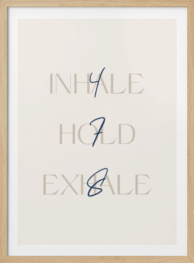 A minimalist framed art print with a cream background. It features the words 'INHALE', 'HOLD', and 'EXHALE' stacked vertically in a light beige serif font. Superimposed over these words are the numbers '4', '7', and '8' respectively, written in a dark blue cursive script, referencing the 4-7-8 breathing technique for relaxation. Wall Art