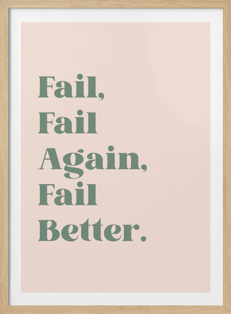 A framed motivational poster with a light pink background. The words 'Fail, Fail Again, Fail Better.' are printed in a bold, green serif font, centered on the page. The poster is enclosed in a simple, thin black frame. Poster