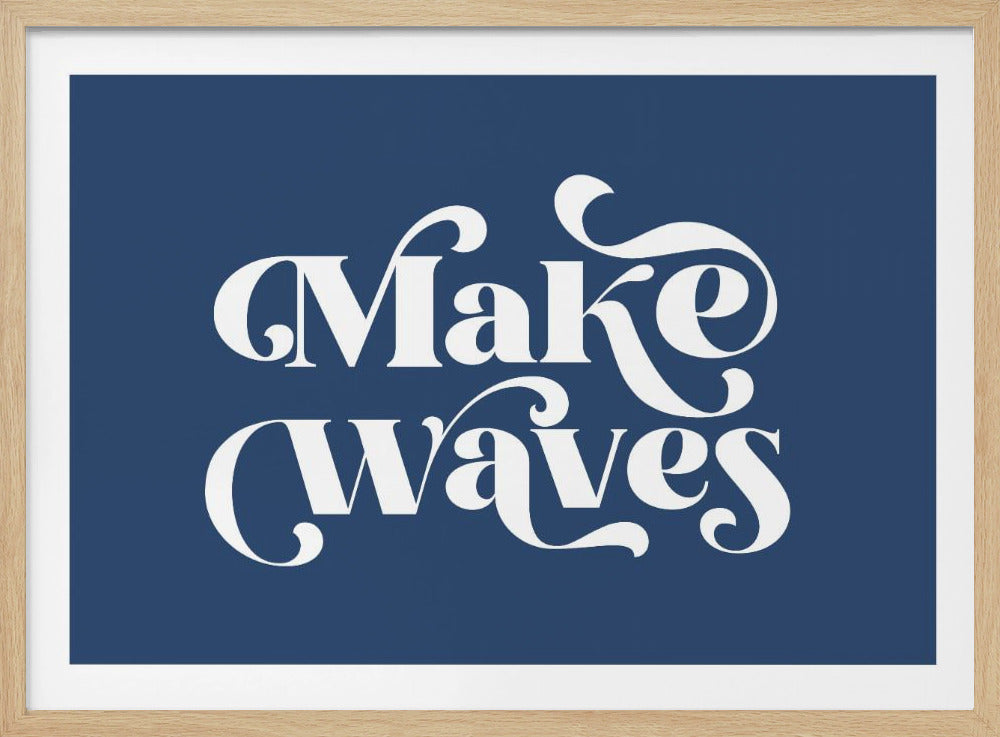 A framed art piece featuring the phrase 'Make Waves' in a stylized, retro white font against a solid dark blue background. The entire image is bordered by a silver frame. Artwork
