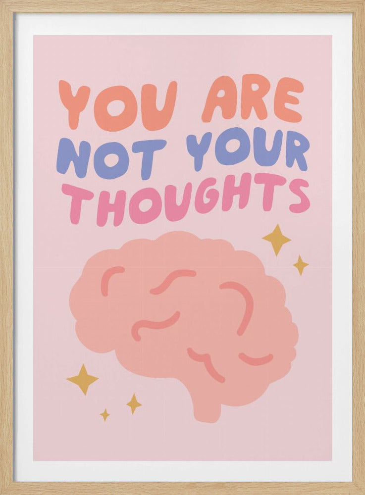 An inspirational poster with a light pink background featuring the text 'YOU ARE NOT YOUR THOUGHTS' in colorful, rounded letters. Below the text is a simple illustration of a pink brain surrounded by yellow sparkles, all enclosed in a black frame. Artwork