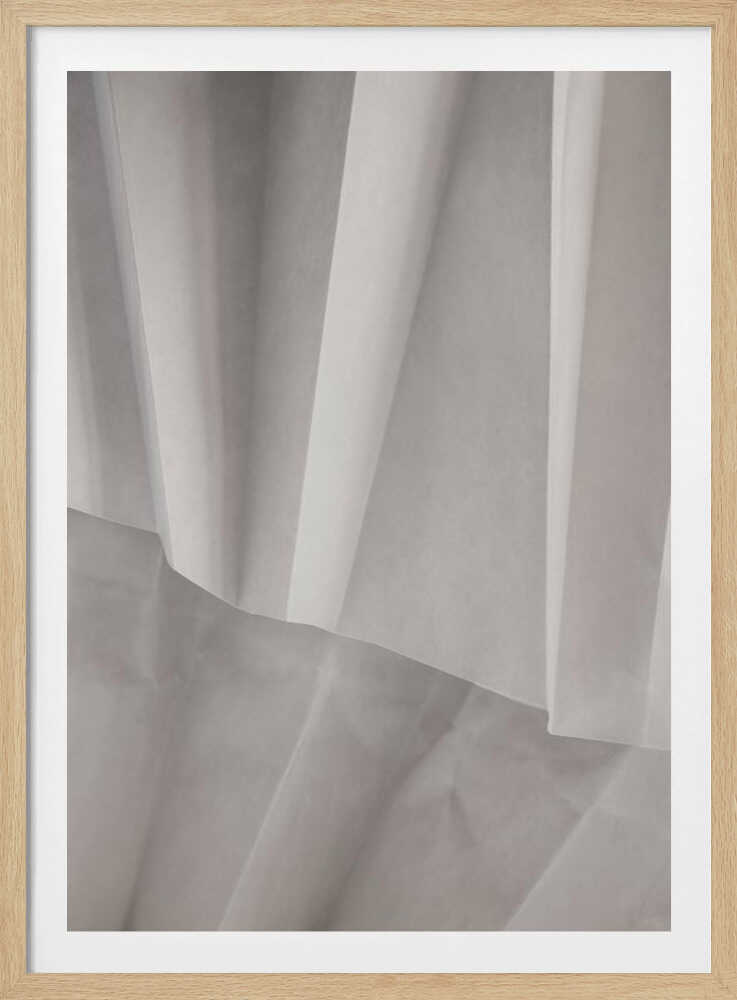 Abstract art print of folded white fabric or paper creating soft lines and deep shadows.