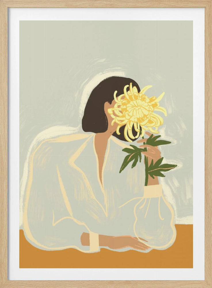 A modern, stylized illustration of a woman with short dark hair in a light blue blouse, sitting at a table. She holds a large yellow chrysanthemum up to her face, obscuring it. Print