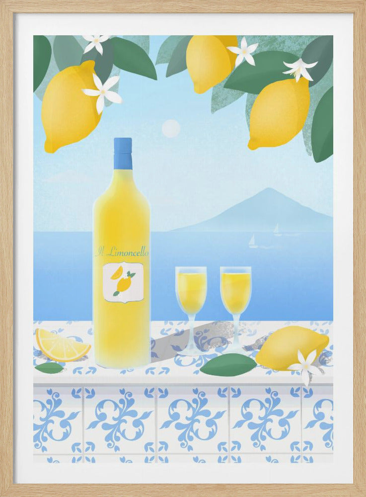 A vibrant illustration of a bottle of limoncello and two full glasses resting on a blue and white tiled table overlooking a serene blue sea with a distant mountain. Lemon branches with yellow lemons and white blossoms frame the top of the scene, evoking a Mediterranean summer. Decor