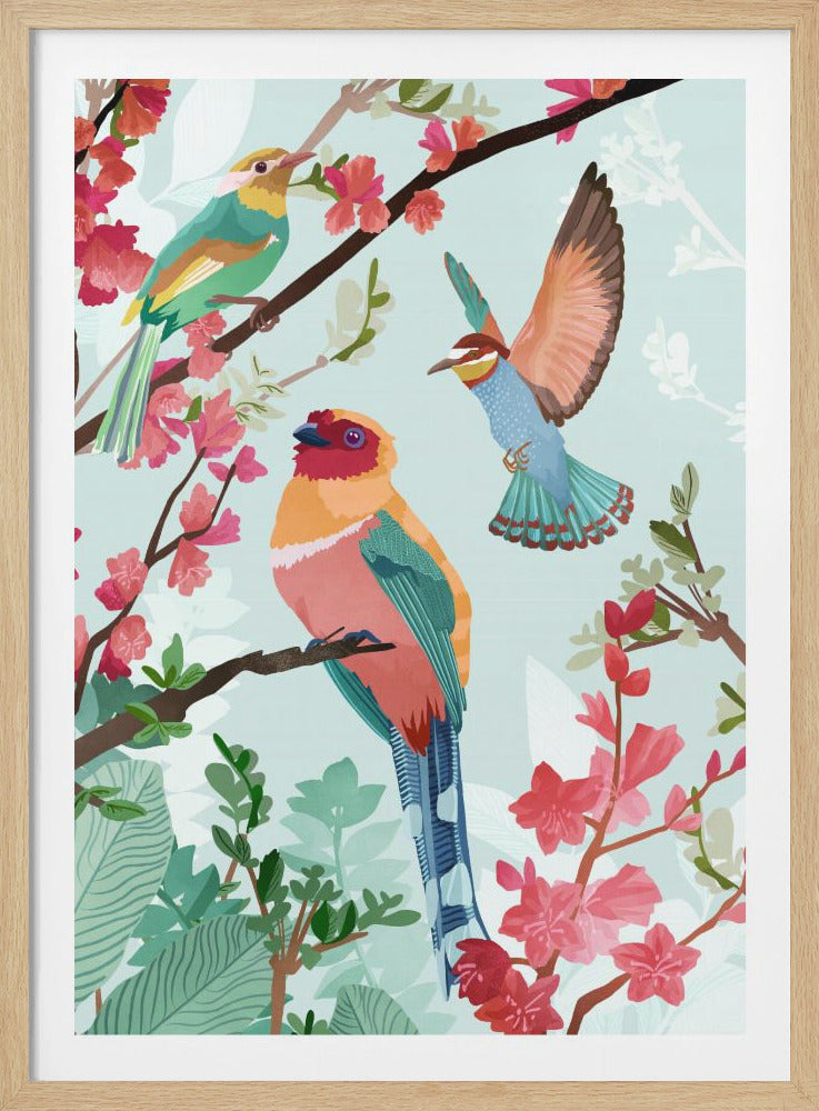 A vibrant, stylized illustration of three colorful exotic birds in a blossoming tree against a light blue background. One bird is perched in the foreground, another in the upper left, and a third is captured in mid-flight. Wall Art