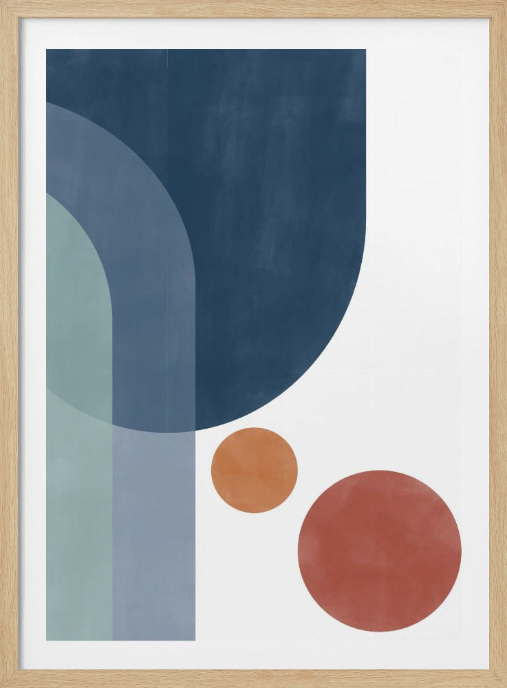 A modern abstract art piece in a black frame, featuring a composition of geometric shapes. On the left, overlapping arched forms in shades of navy, slate, and teal blue create a sense of depth. On the right, against a stark white background, sit two circles: a smaller burnt orange one above a larger terracotta red one. Print