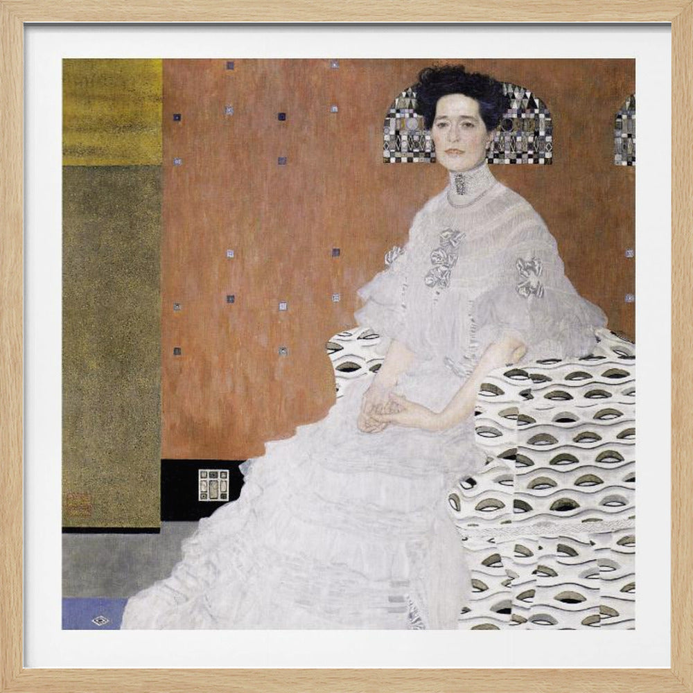 A framed print of Gustav Klimt's 'Portrait of Fritza Riedler'. A woman with dark upswept hair wearing a flowing white gown sits in a patterned armchair against a geometric, earth-toned background. Decor