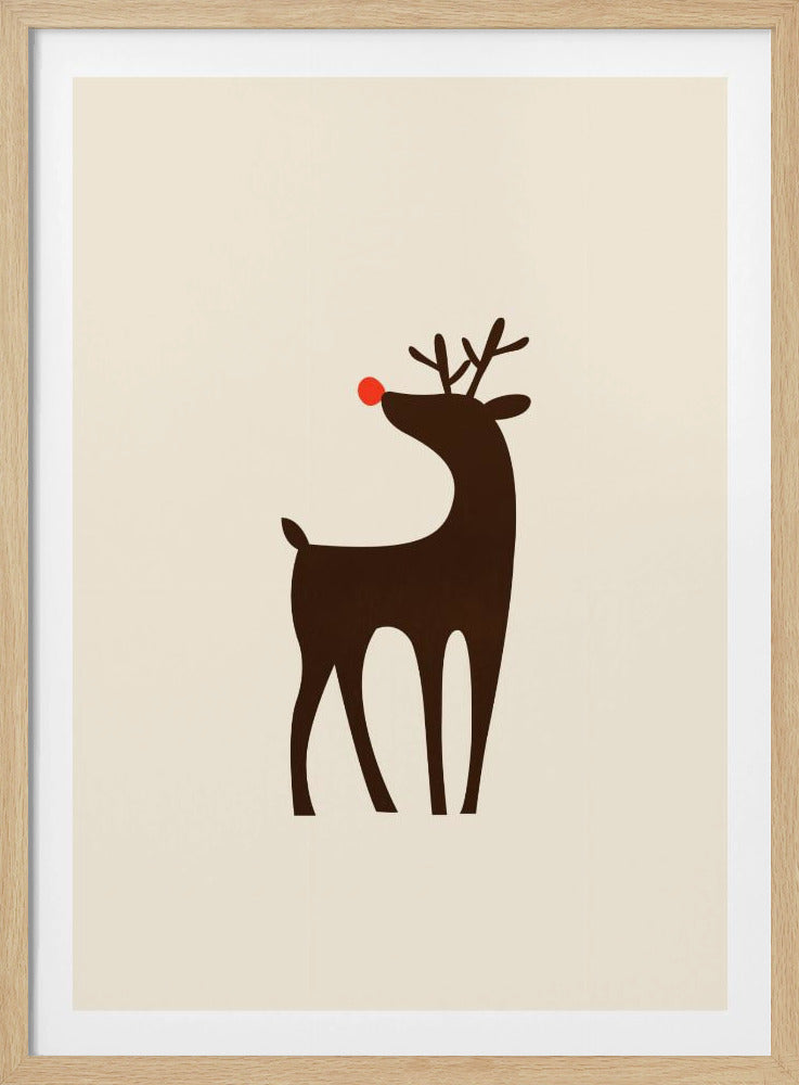 A minimalist art print of a stylized brown reindeer with a bright red nose, standing in profile against a cream-colored background, all enclosed in a simple black frame. Print