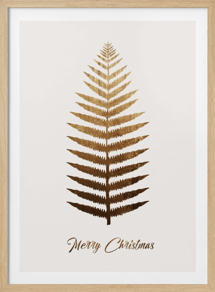 A framed holiday print with a large gold foil fern leaf on a white background. Below the leaf, 'Merry Christmas' is written in gold cursive script. The artwork is enclosed in a thin black frame. Decor