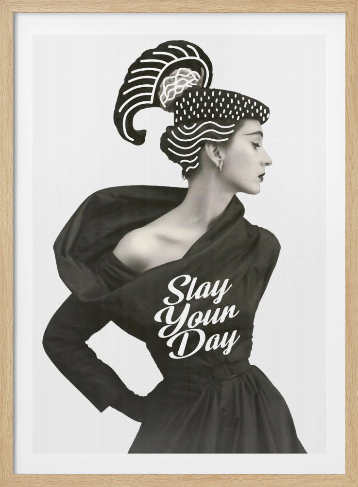 A framed black and white vintage-style photograph of a woman in profile wearing an elegant black dress and an elaborate hat. Modern graphic patterns are overlaid on her hat, and the motivational phrase 'Slay Your Day' is printed in white script on her dress. Decor